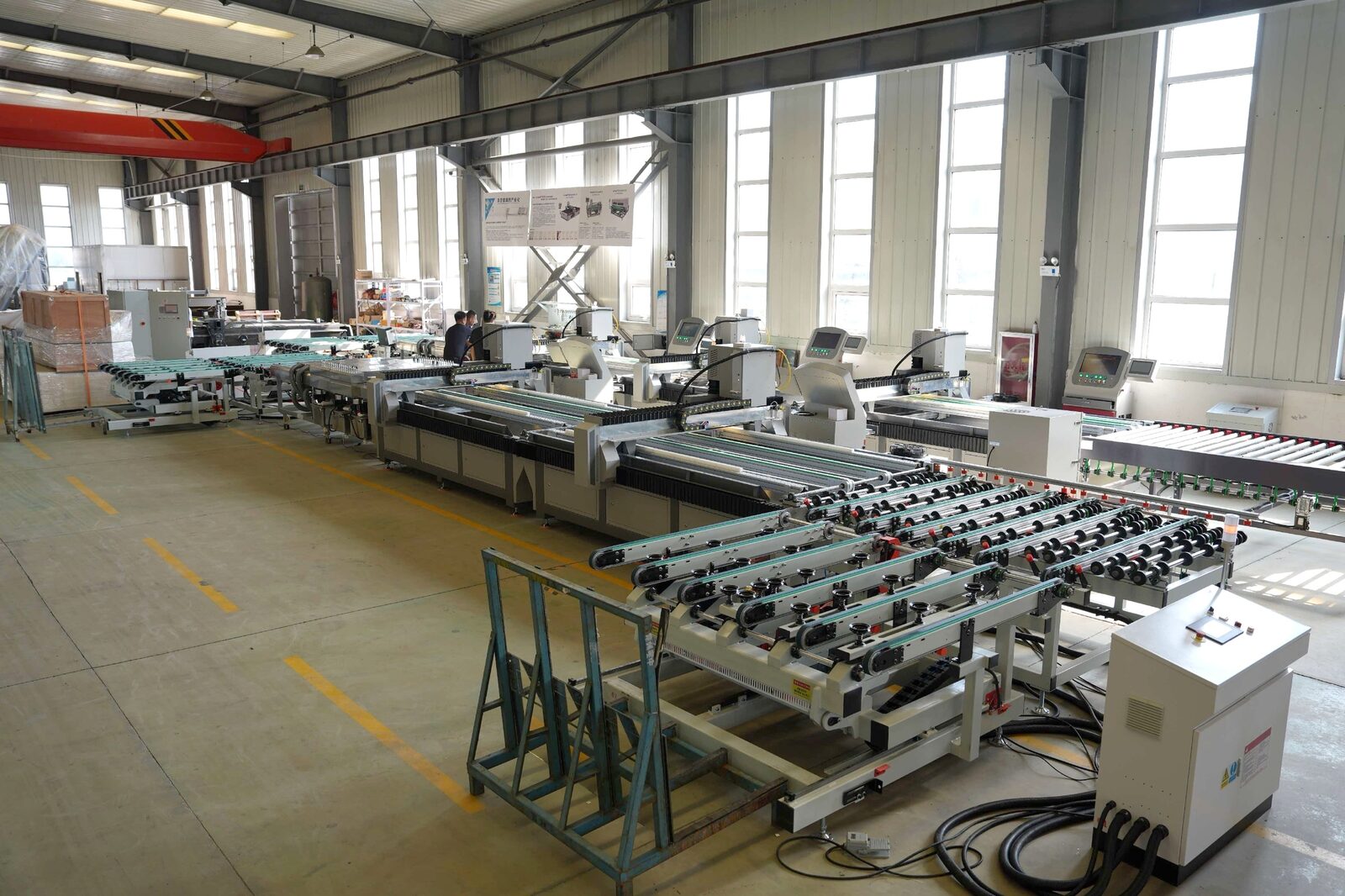 Glass laser drilling line with lasers in series in the workshop